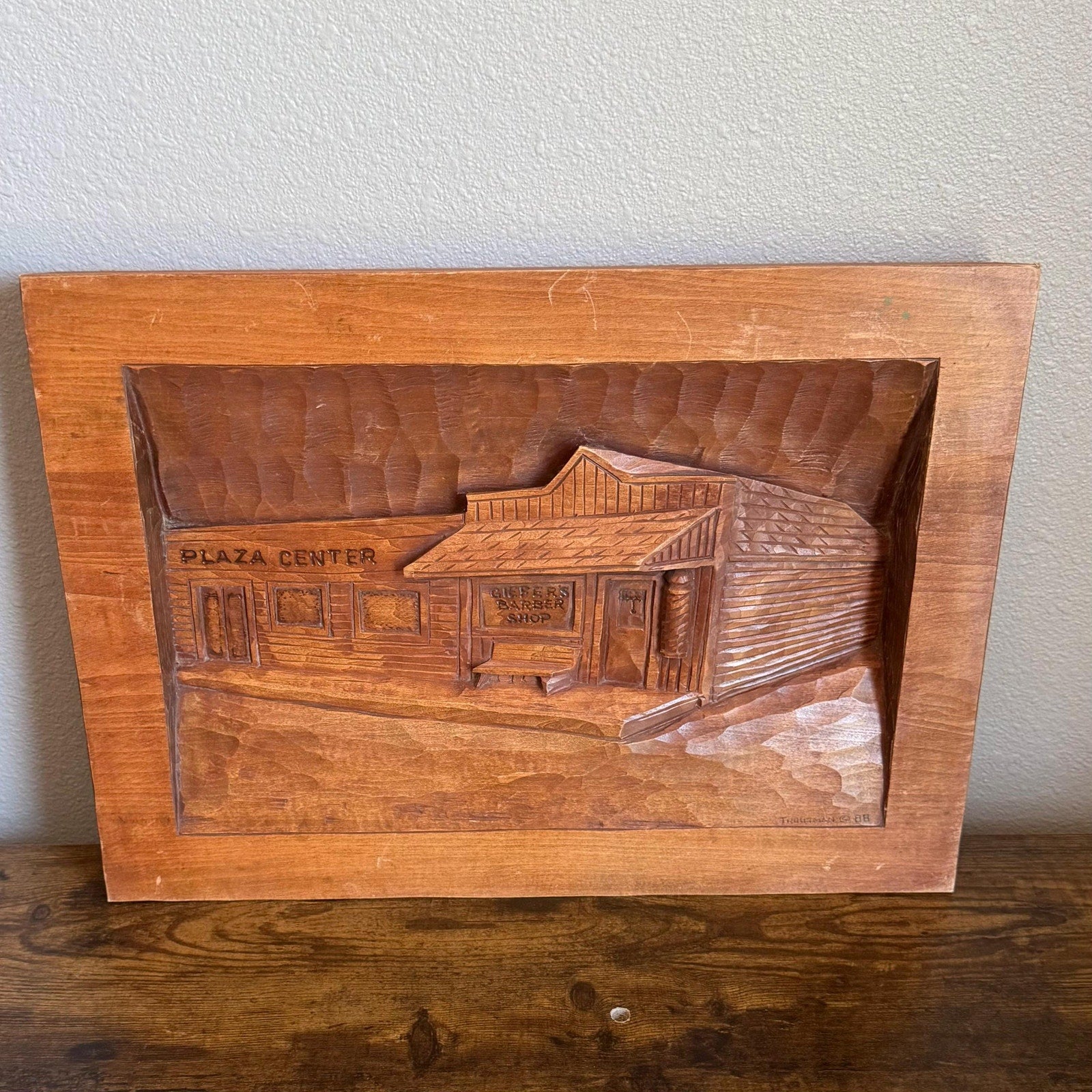 Plaza Center Hand Carved Wood Wall Art by Troutman