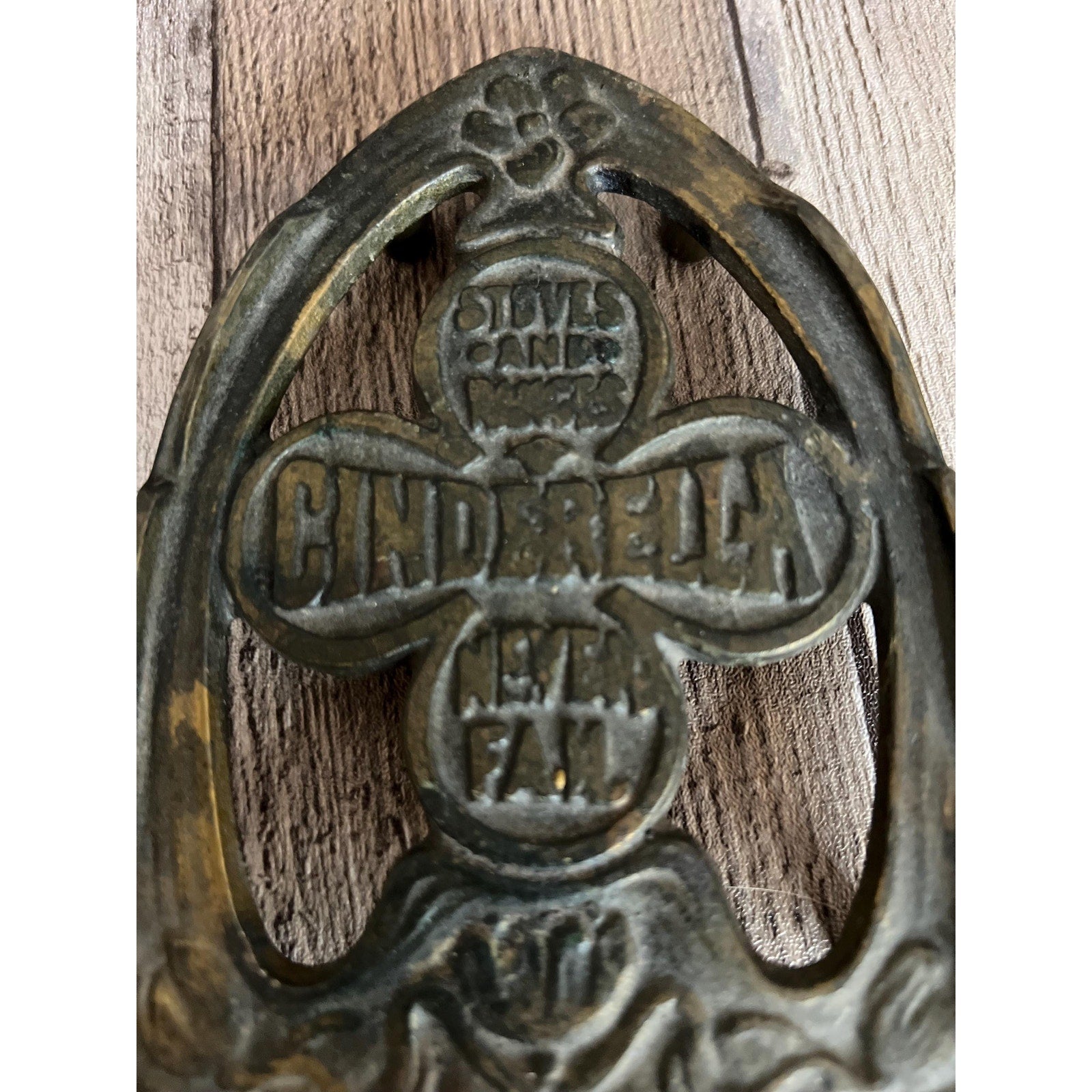 Cinderella Stove & Ranges Never Fails Footed Iron Promotional Trivet
