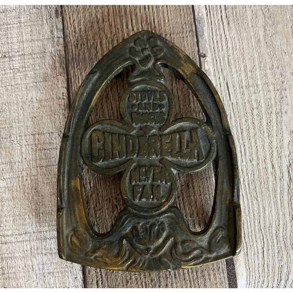 Cinderella Stove & Ranges Never Fails Footed Iron Promotional Trivet