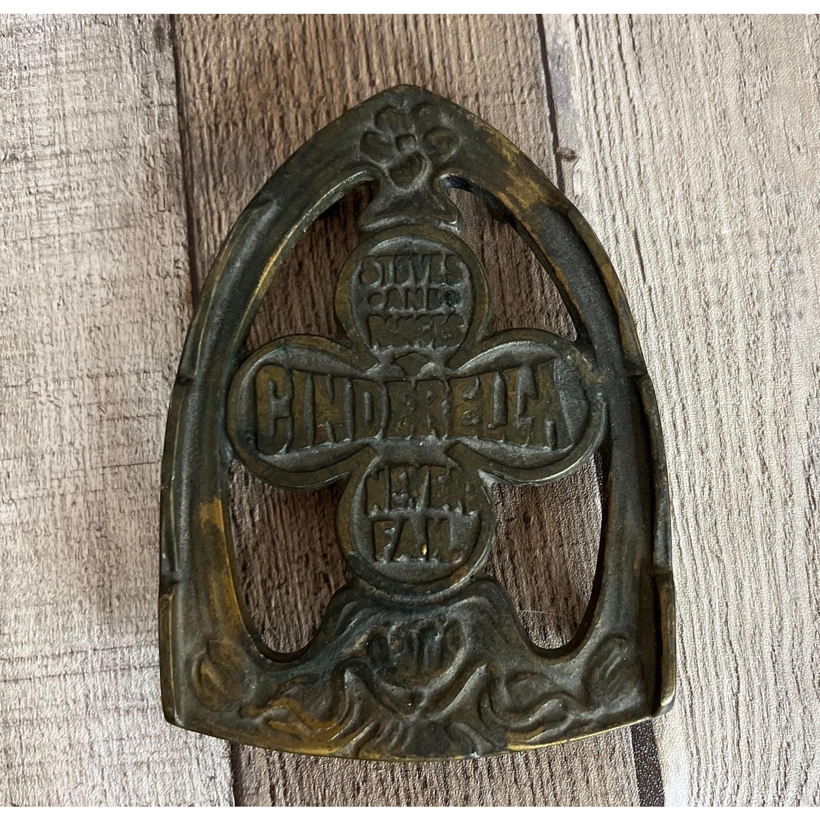 Cinderella Stove & Ranges Never Fails Footed Iron Promotional Trivet