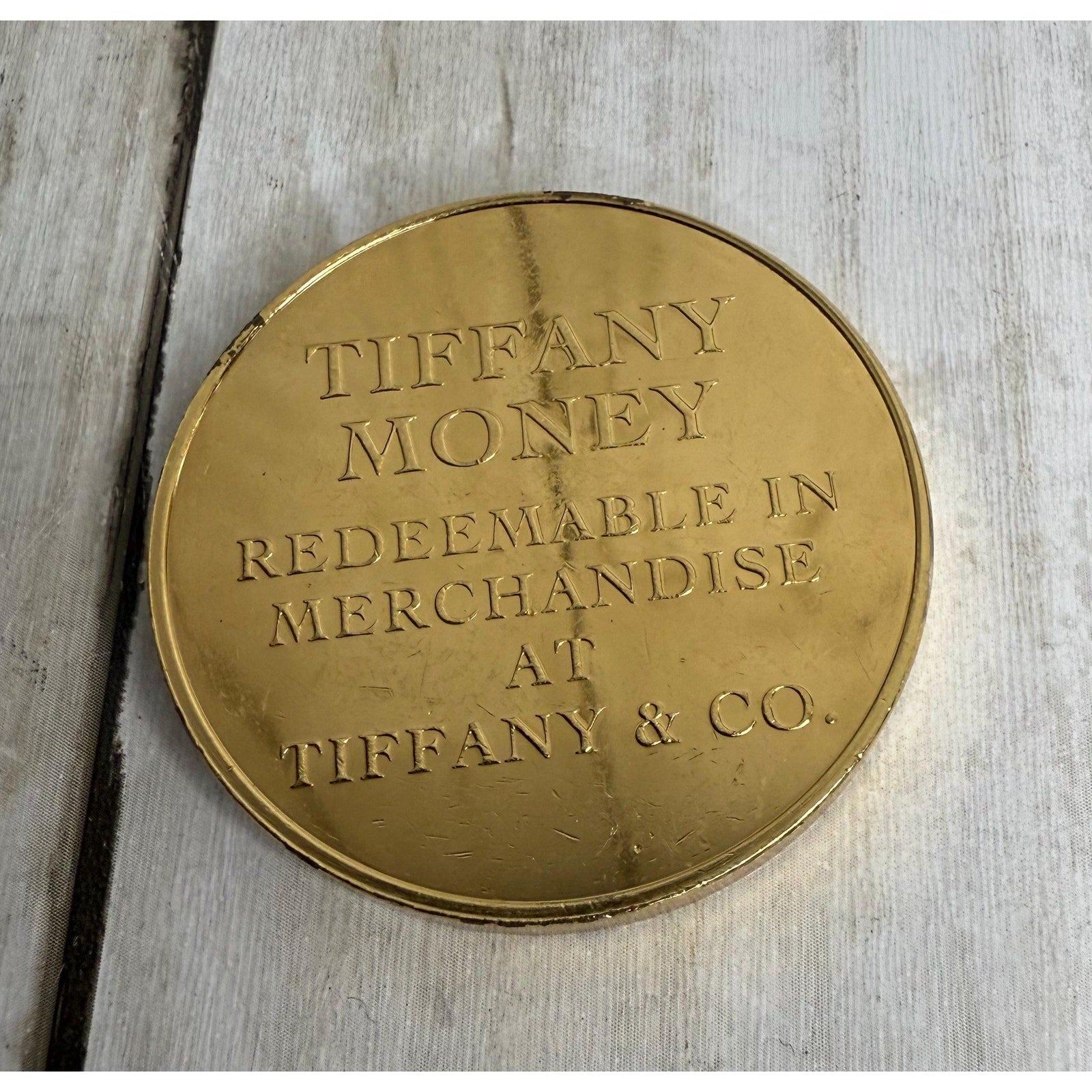Tiffany and Co. 100 Dollar Gold Plated Token W/Pouch