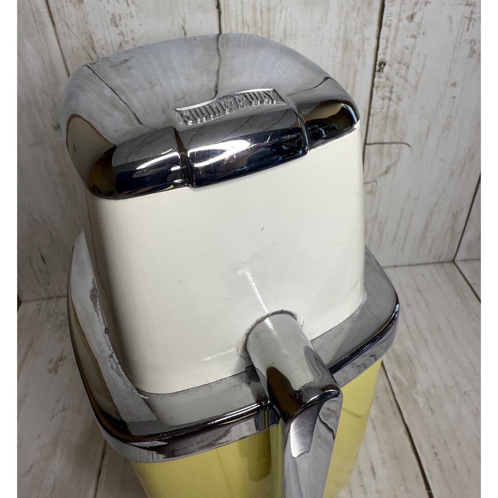 Yellow and White Manual Ice Crusher
