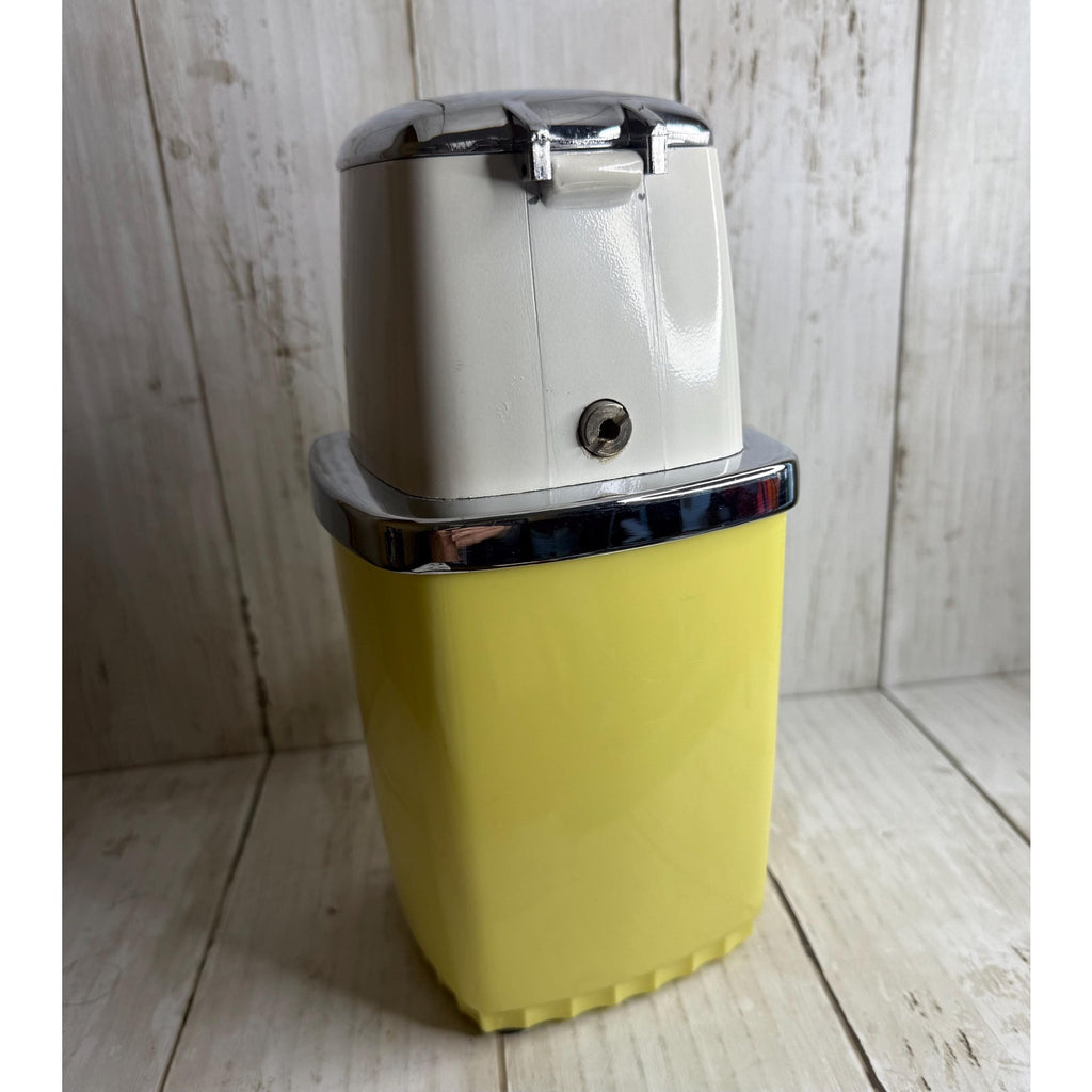 Yellow and White Manual Ice Crusher