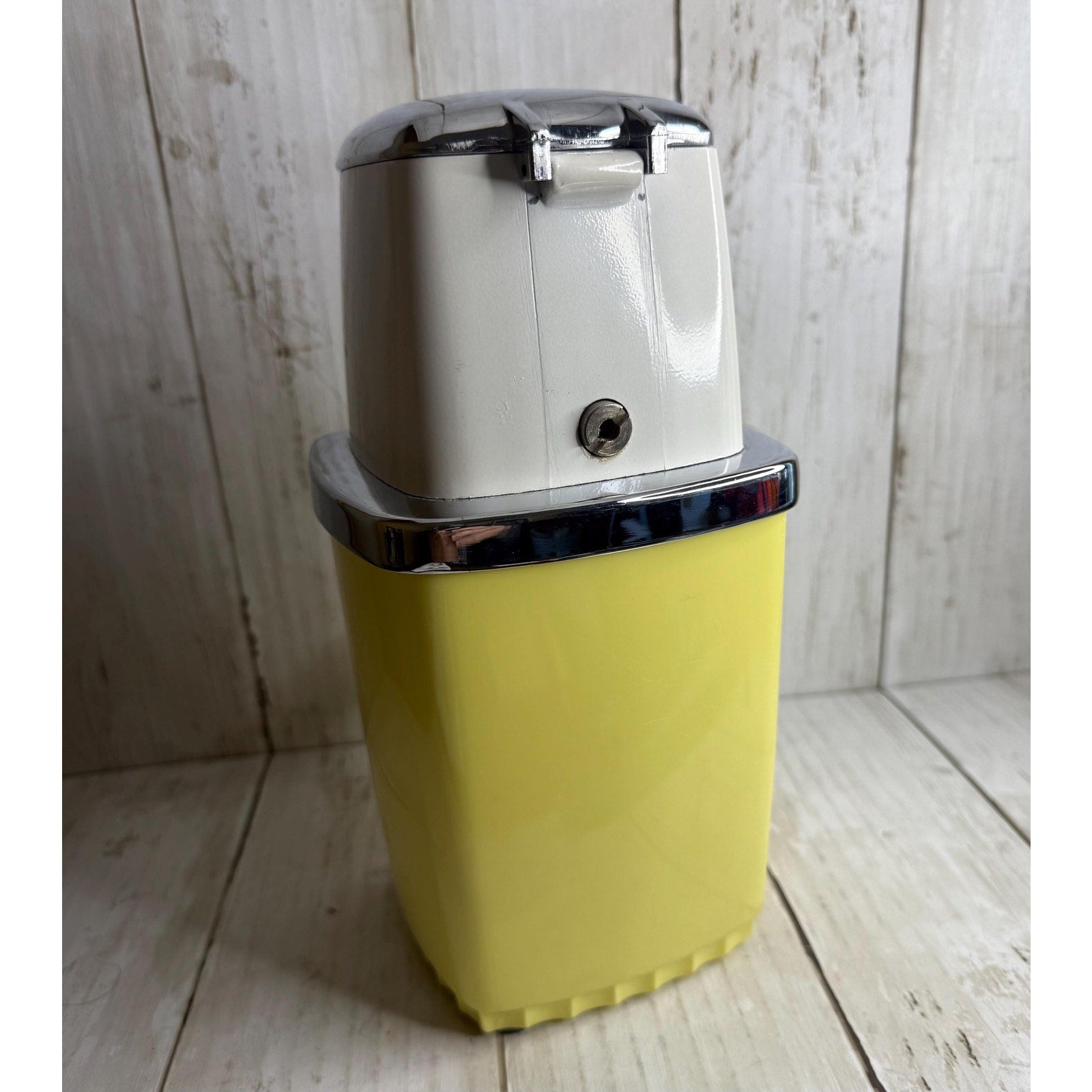 Yellow and White Manual Ice Crusher
