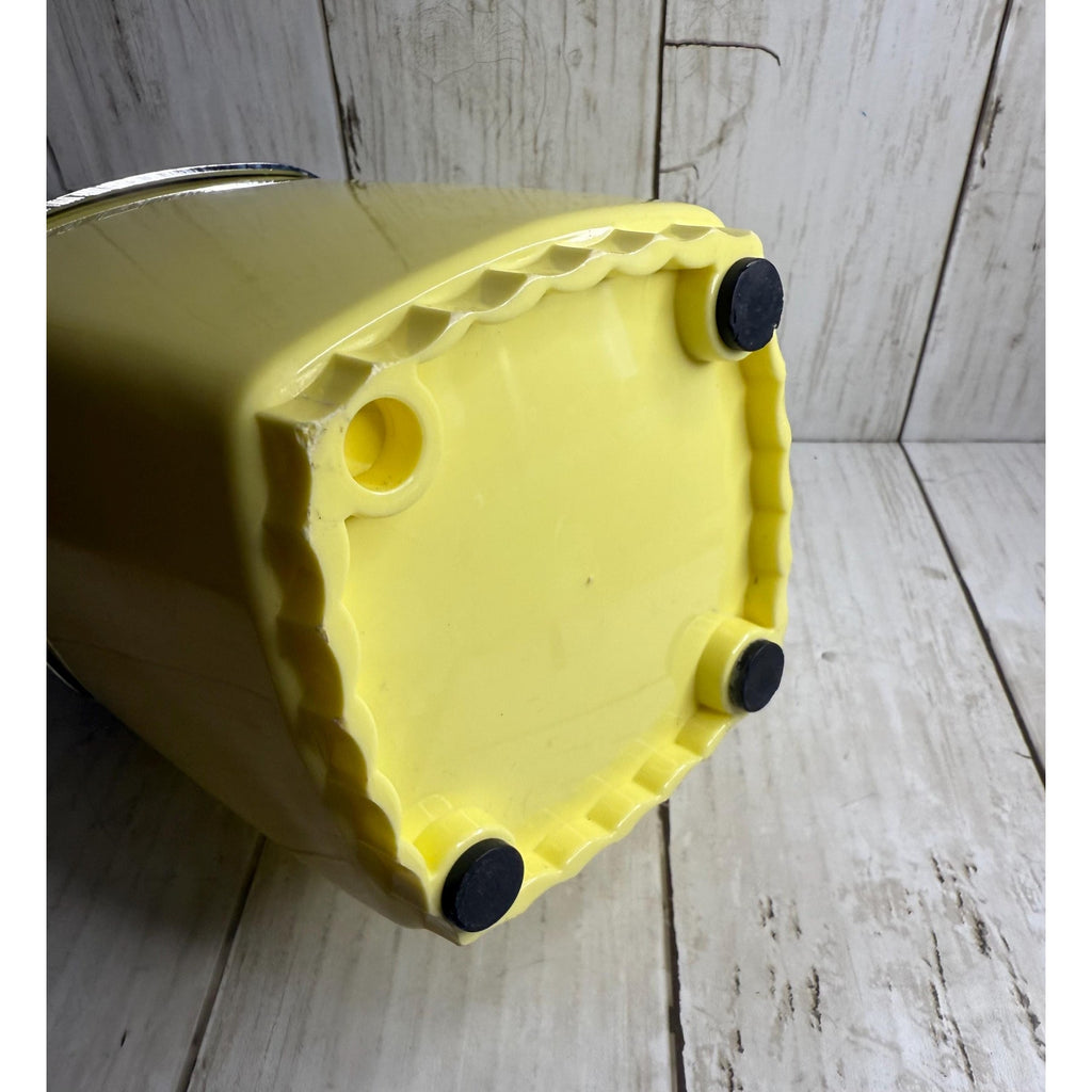 Yellow and White Manual Ice Crusher